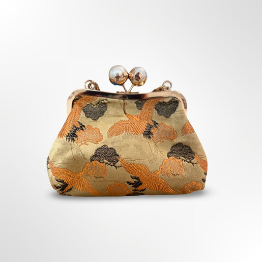 Bolso de mano con cadena de perlas