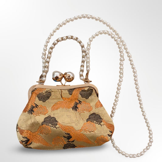 Bolso de mano con cadena de perlas